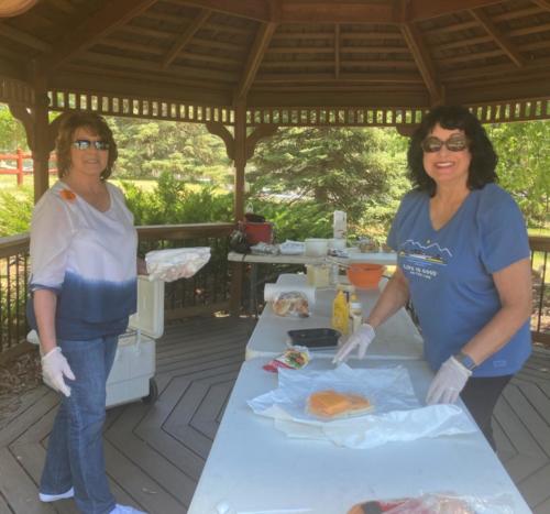Diane & Char setting up for 50's picnic